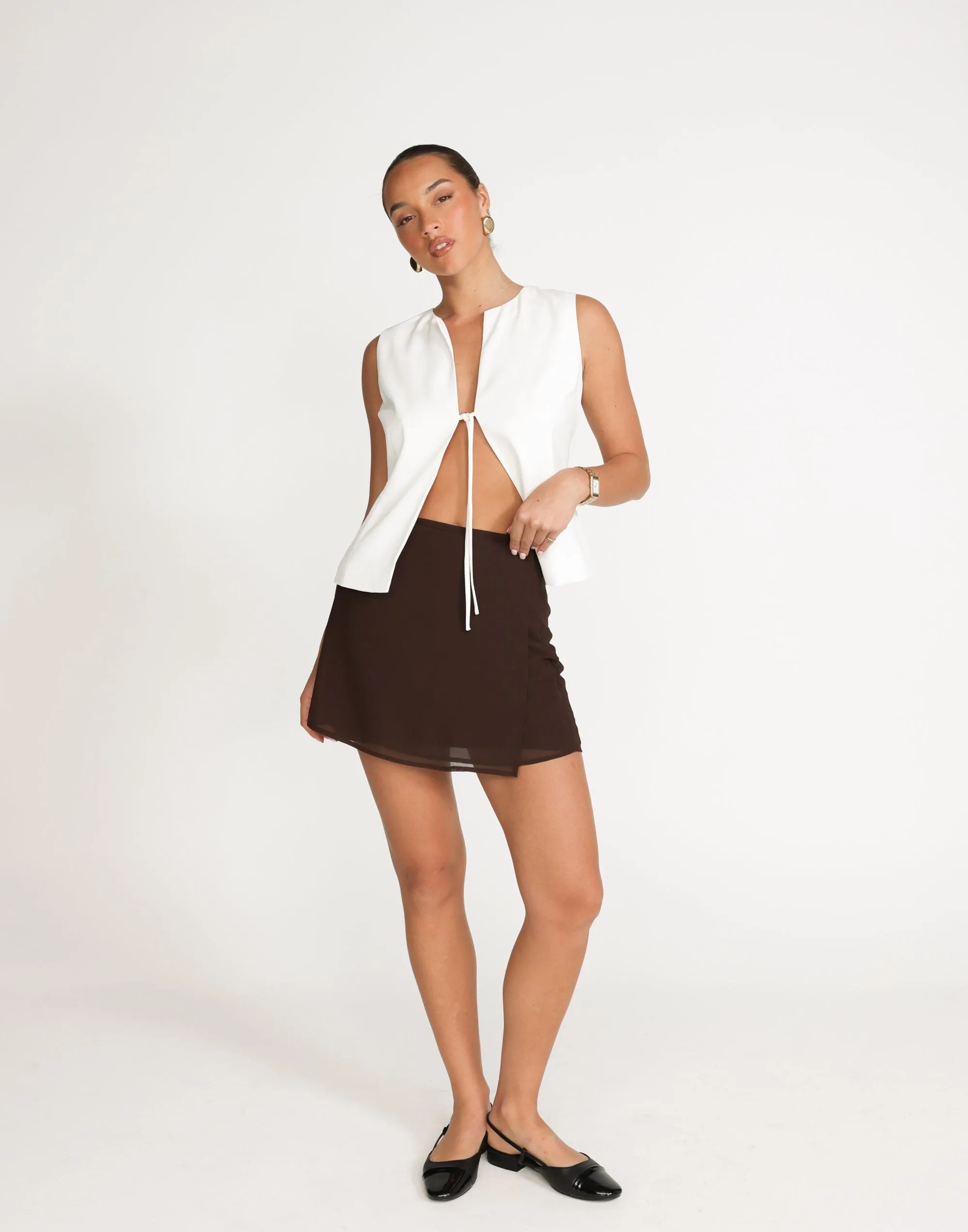 Abby Mini Skirt (Cocoa) sold by Charcoal Clothing