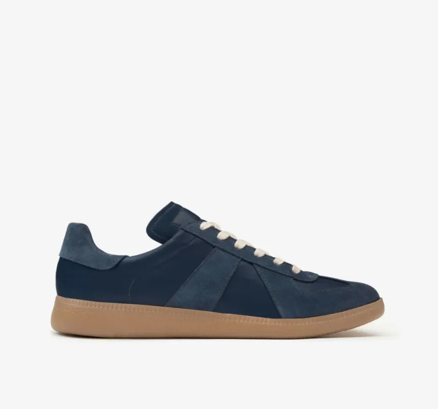 GAT | Navy sold by Oliver Cabell