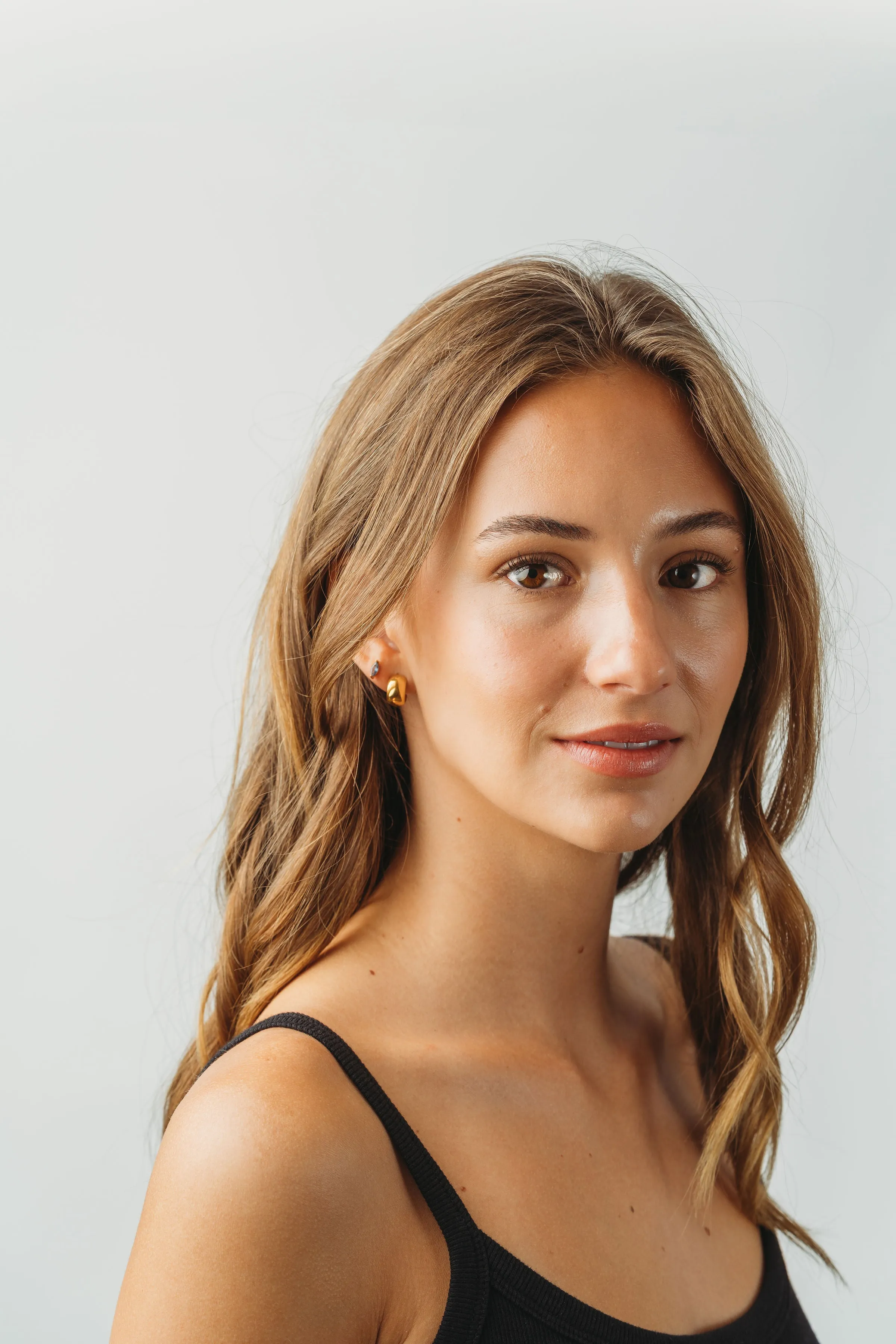 Simple gold rounded earrings sold by Salty Cali product image thumbnail 4