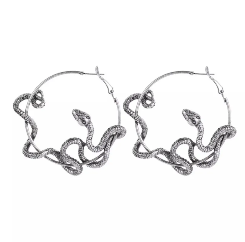 Boucles d’oreilles serpent sold by Vintage Romance