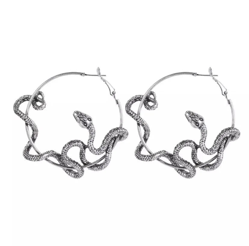 Boucles d’oreilles serpent sold by Vintage Romance
