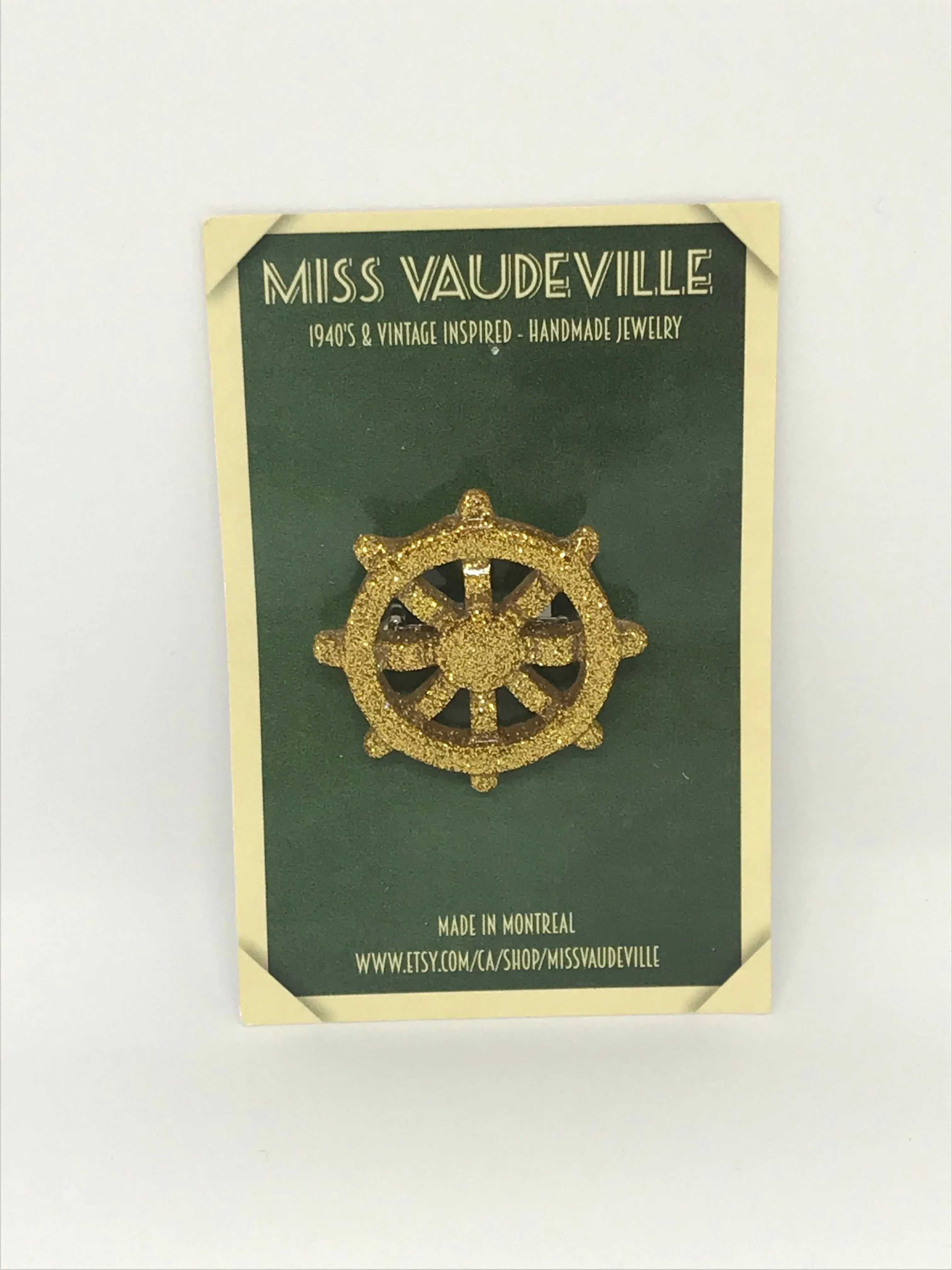 Broche gouvernail doré sold by Vintage Romance