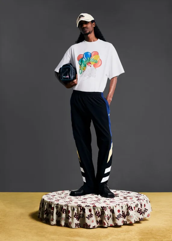 PANELLED TRACKPANT in BLACK AND YELLOW sold by Martine Rose