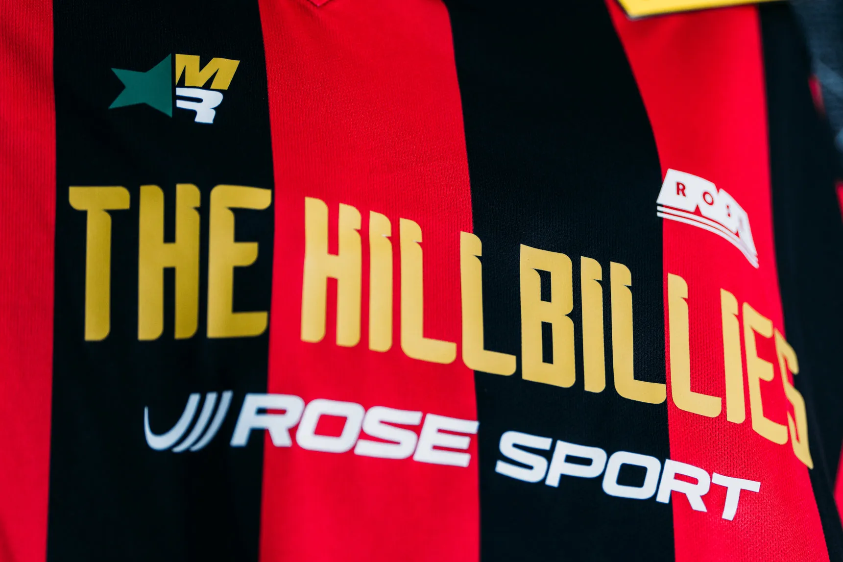 MARTINE ROSE FOR THE HILLBILLIES S/S TWIST FOOTBALL TOP in RED & BLACK sold by Martine Rose product image thumbnail 2