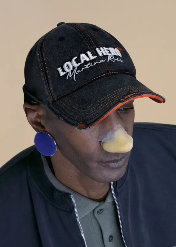 ROLL BACK CAP in BLACK ORANGE made by Martine Rose