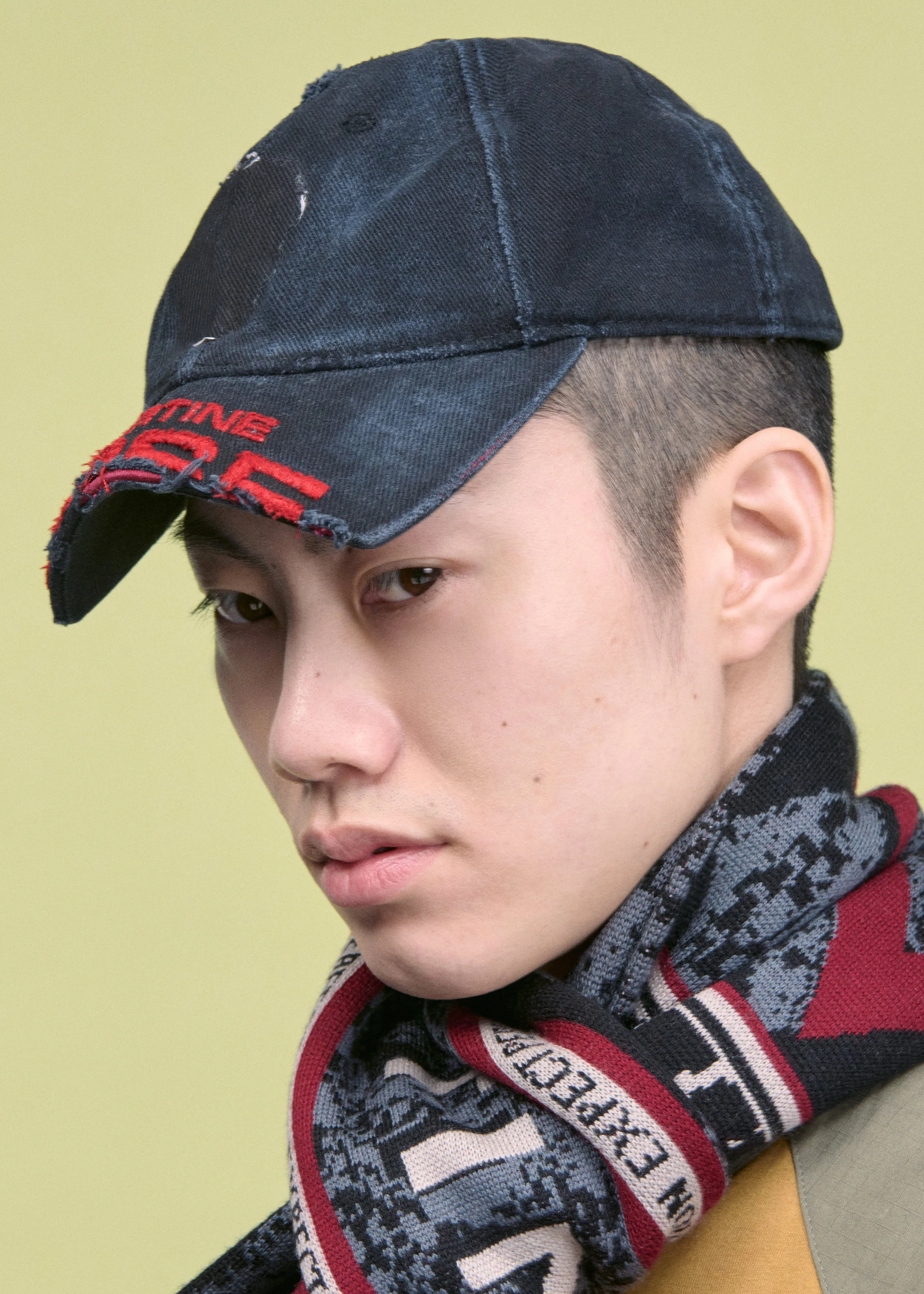 CUT PEAK CAP in WASHED BLACK sold by Martine Rose