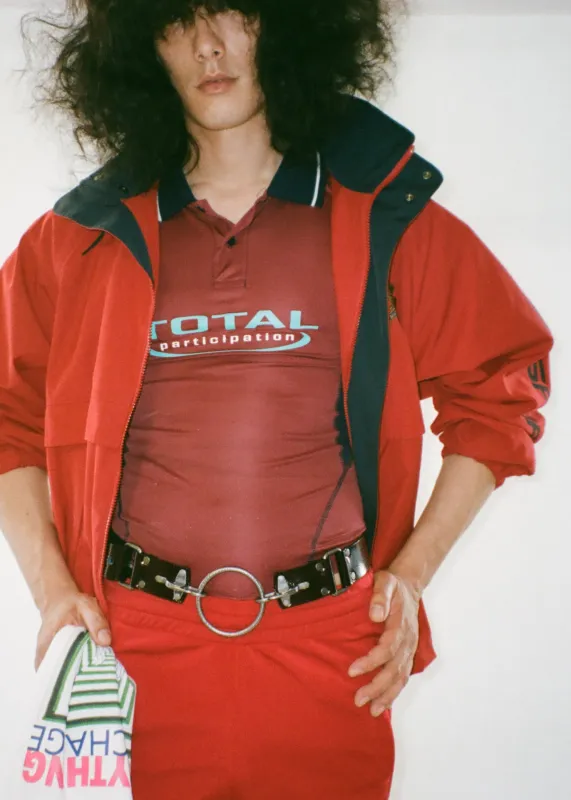 SHRUNKEN STRETCH FOOTBALL VEST in BURGUNDY made by Martine Rose