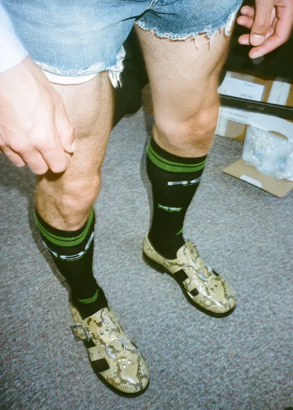 SHEER FOOTBALL SOCK in BLACK made by Martine Rose