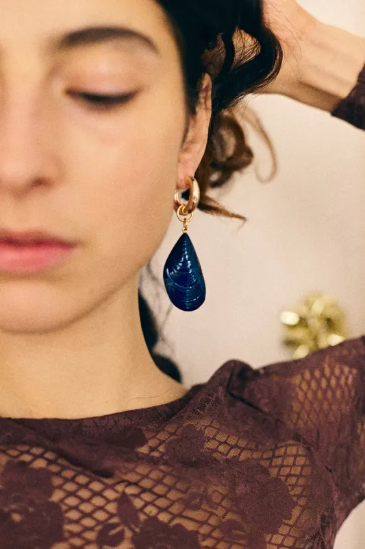 Lovers earring Mussel sold by Bangle Begum