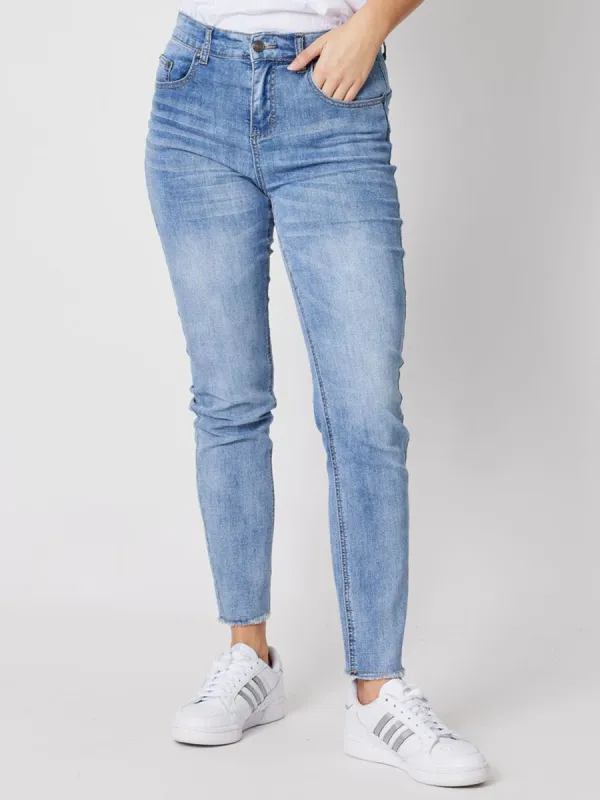 Fringed Slim Leg Jean - Battered Denim sold by RC & Co