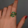 2.38ct Emerald 18K Gold Three Row Ring sold by Wish Fine Jewelry