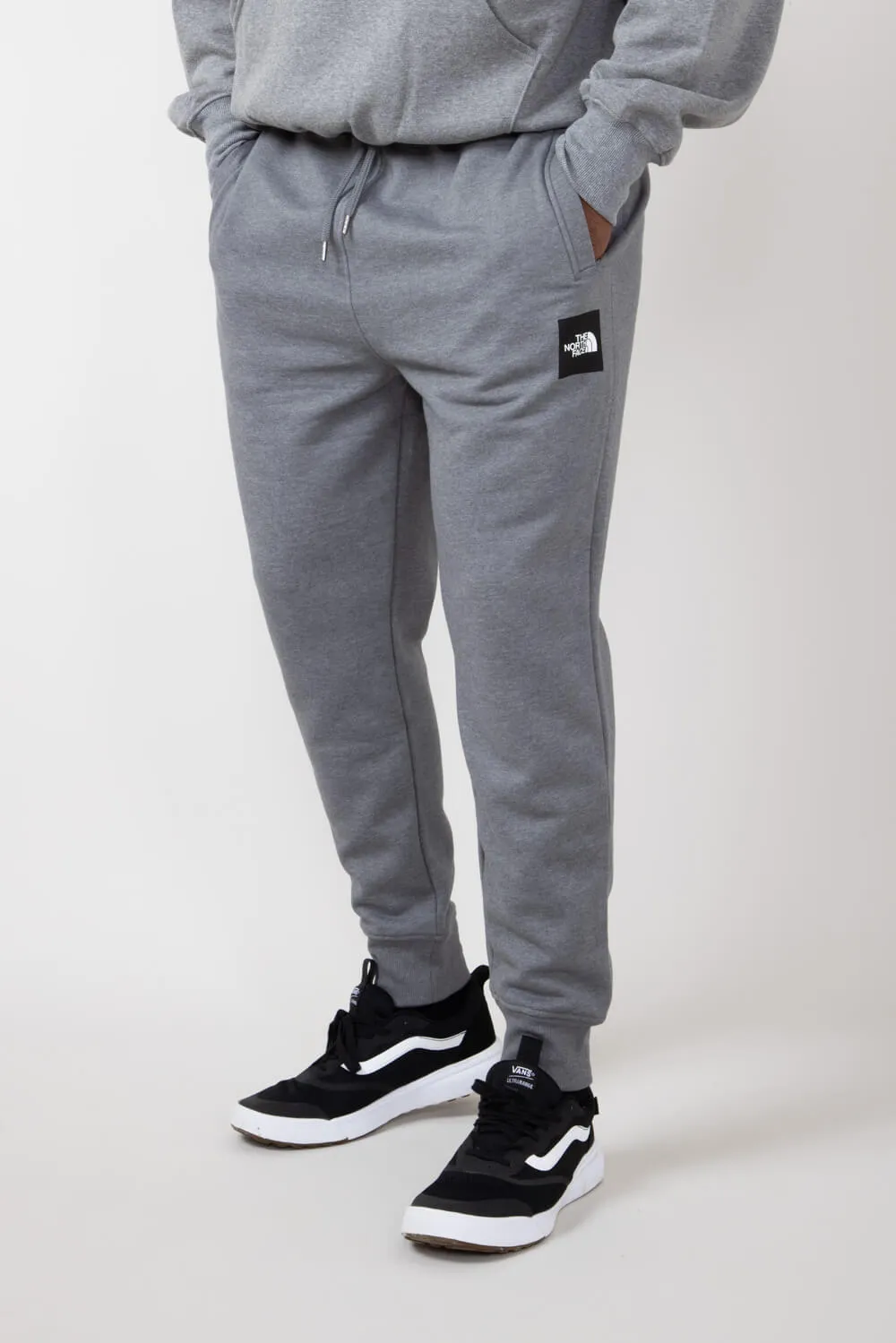 The North Face Core Joggers for Men in Grey | NF0A8A33-GVD-GRY sold by Glik’s