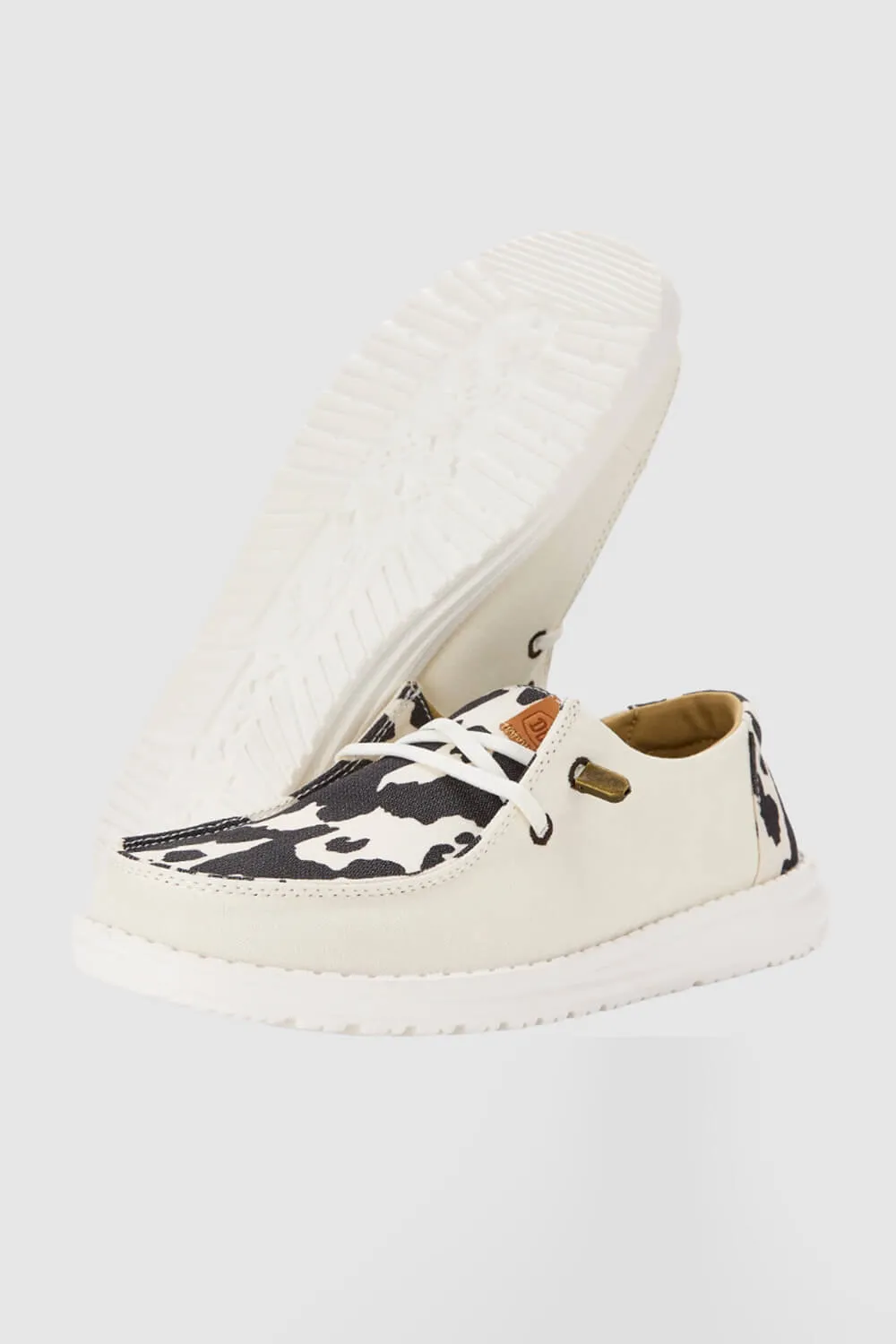 HEYDUDE Women’s Wendy Cow Print Shoes in White/Black | 41037-11G sold by Glik’s product image thumbnail 4