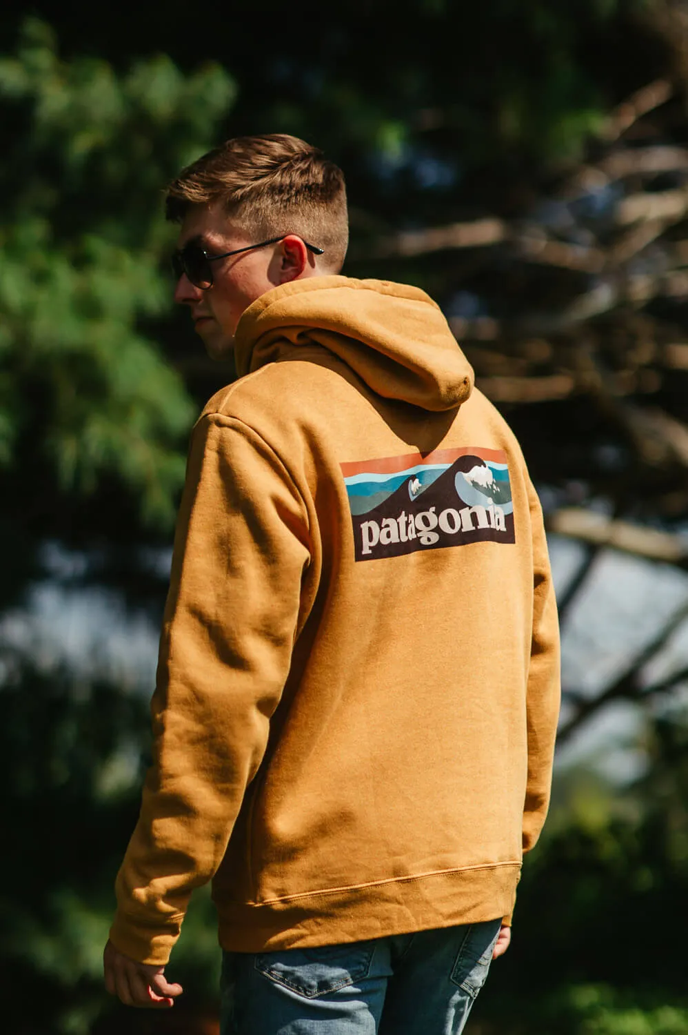 Patagonia Men’s Boardshort Logo Uprisal Hoodie in Mango Yellow | 39665-DMGO sold by Glik’s