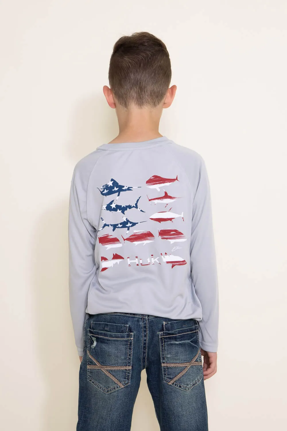 Huk Fishing Youth KC Flag Fish Pursuit Long Sleeve T-Shirt for Boys in Grey | H7120081-034 sold by Glik’s