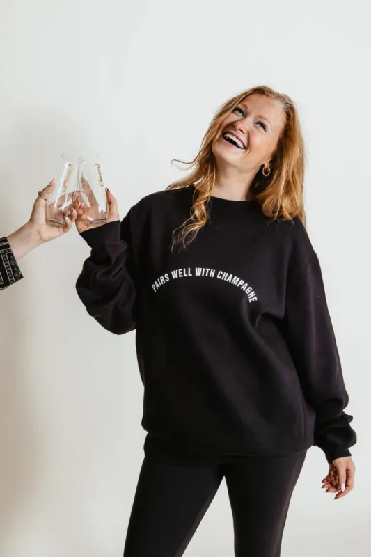 Pairs Well With Champagne Sweatshirt for Women in Black | SS1287-BLACK sold by Glik’s