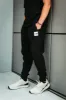 The North Face Box Logo Joggers for Men in Black | NF0A7UOA-KY4 BLACK WHITE sold by Glik’s