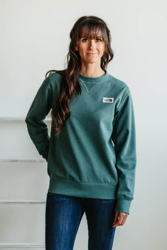 The North Face Heritage Patch Sweatshirt for Women in Green Sage | NF0A7UOO-I0F sold by Glik’s