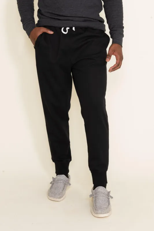 The North Face Heritage Patch Joggers for Men in Black | NF0A7WXI-JK3 BLACK sold by Glik’s