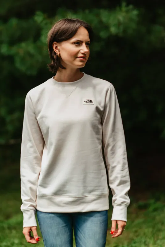 The North Face Heritage Patch Sweatshirt for Women in White | NF0A7UOO-N3N sold by Glik’s