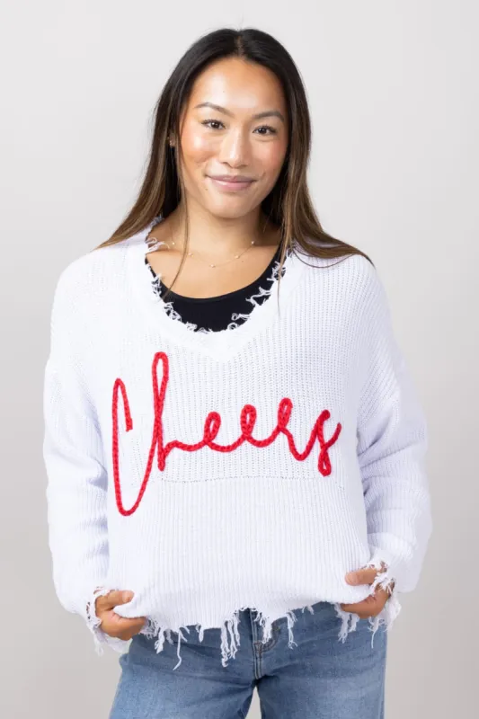Simply Southern Cheers Distressed V-Neck Sweater for Women in White | PP-0224-SWTR-KNT-VNCK-CHEERS sold by Glik’s