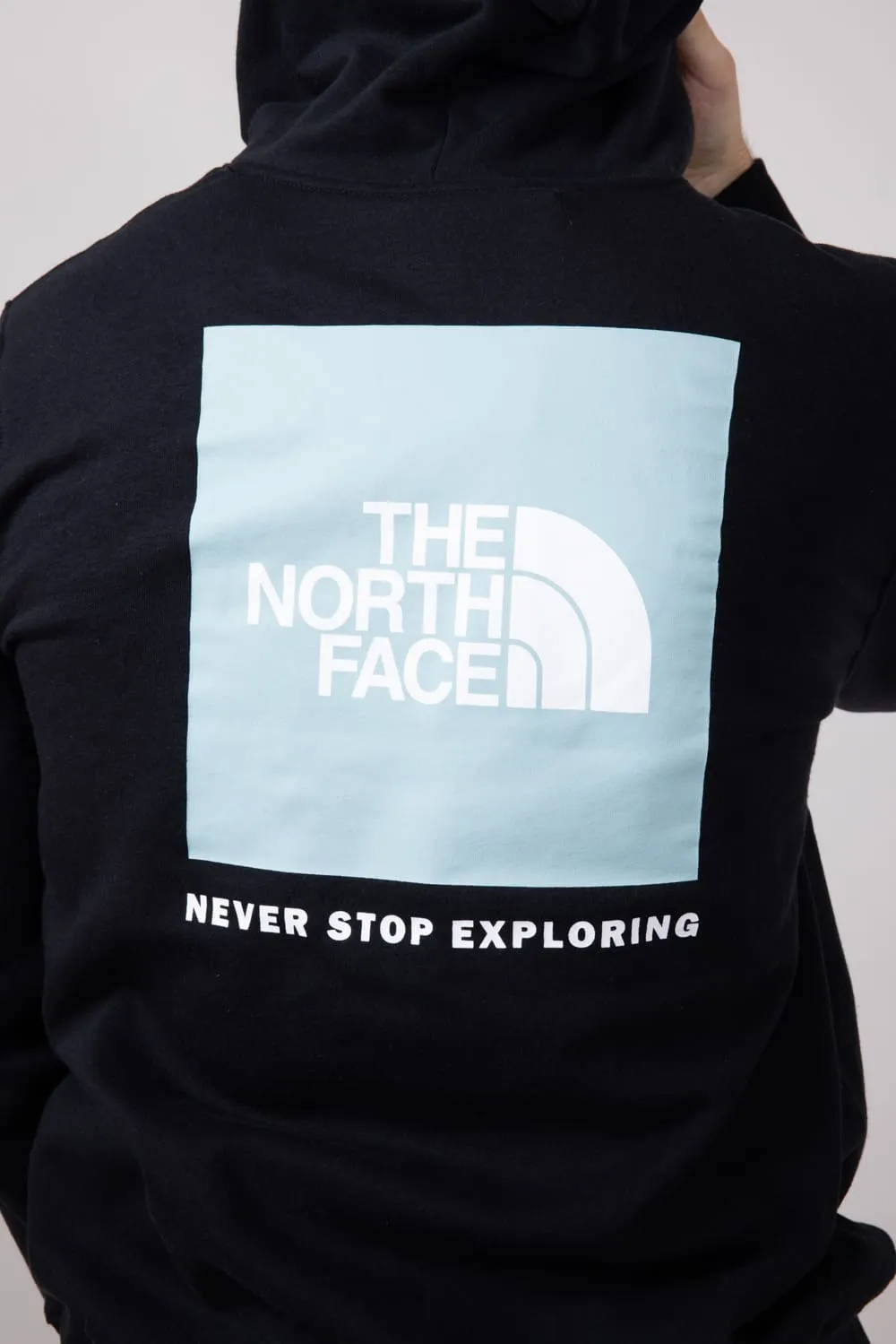 The North Face Box Logo Hoodie for Men in Black/Blue | NF0A7UNS-ODY-BLK sold by Glik’s