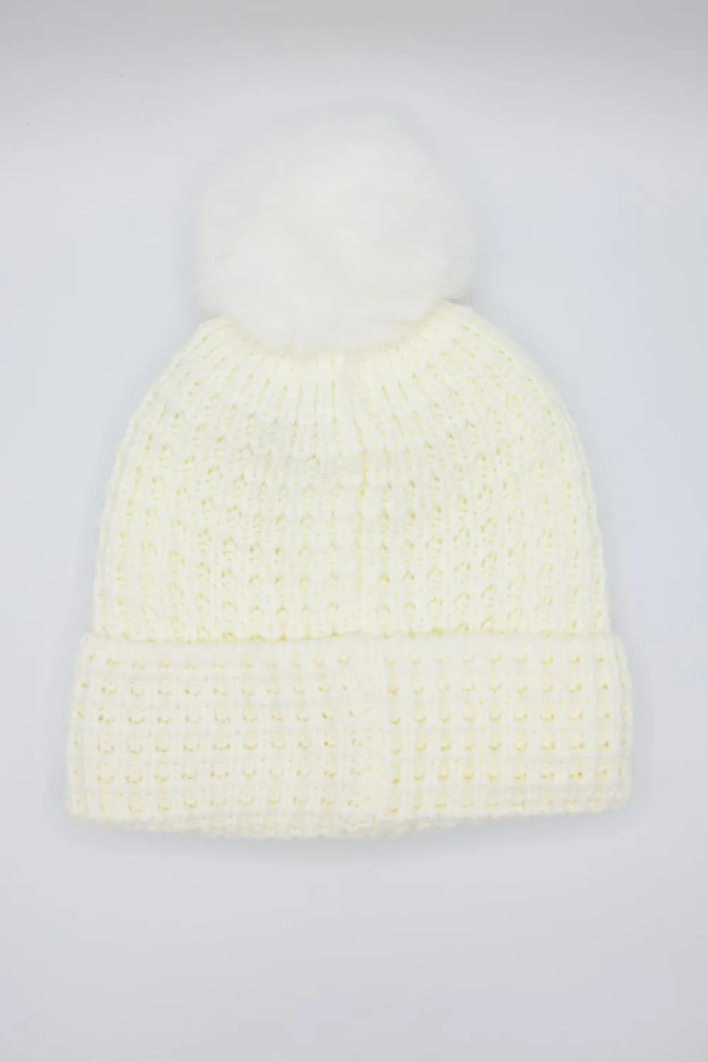 C.C. Waffle Knit Beanie with a Fur Pom for Women in Ivory | HTE0032-IVORY sold by Glik’s product image thumbnail 3