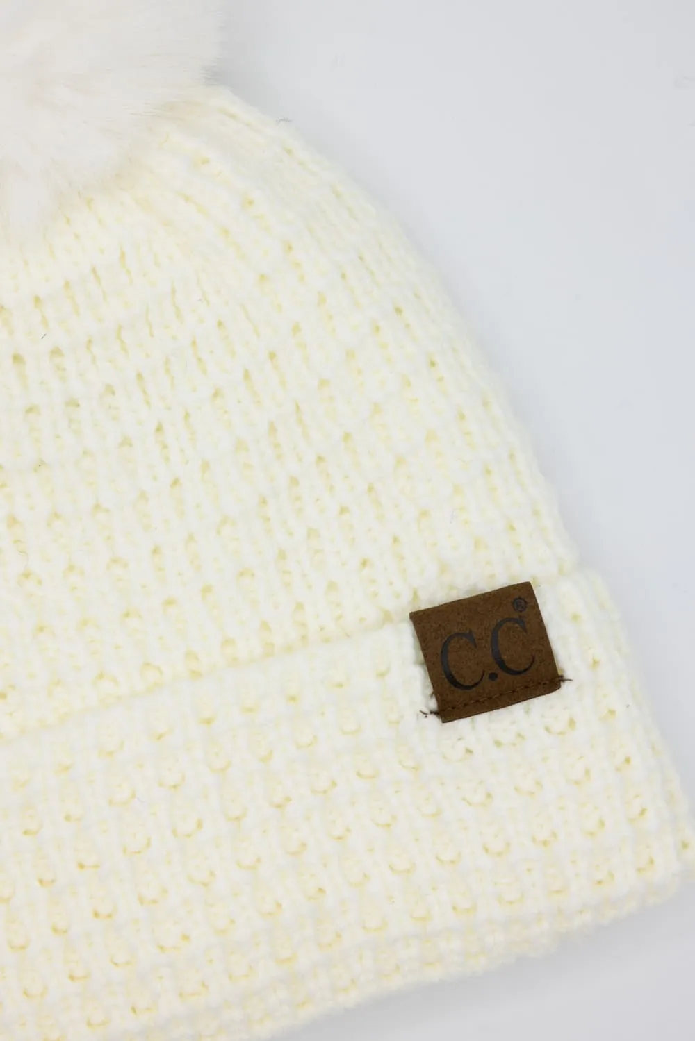 C.C. Waffle Knit Beanie with a Fur Pom for Women in Ivory | HTE0032-IVORY sold by Glik’s product image thumbnail 2