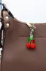 Double Beaded Cherry Purse Charm in Silver | CH118 sold by Glik’s