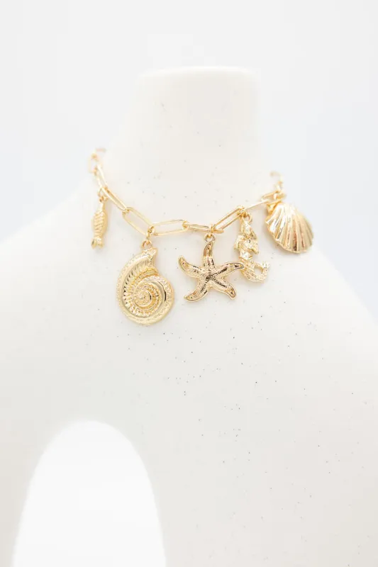Sea Life Charm Bracelet in Gold | QBA469GD sold by Glik’s