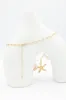 Starfish Charm Necklace in Gold | ENA737GDCRM sold by Glik’s