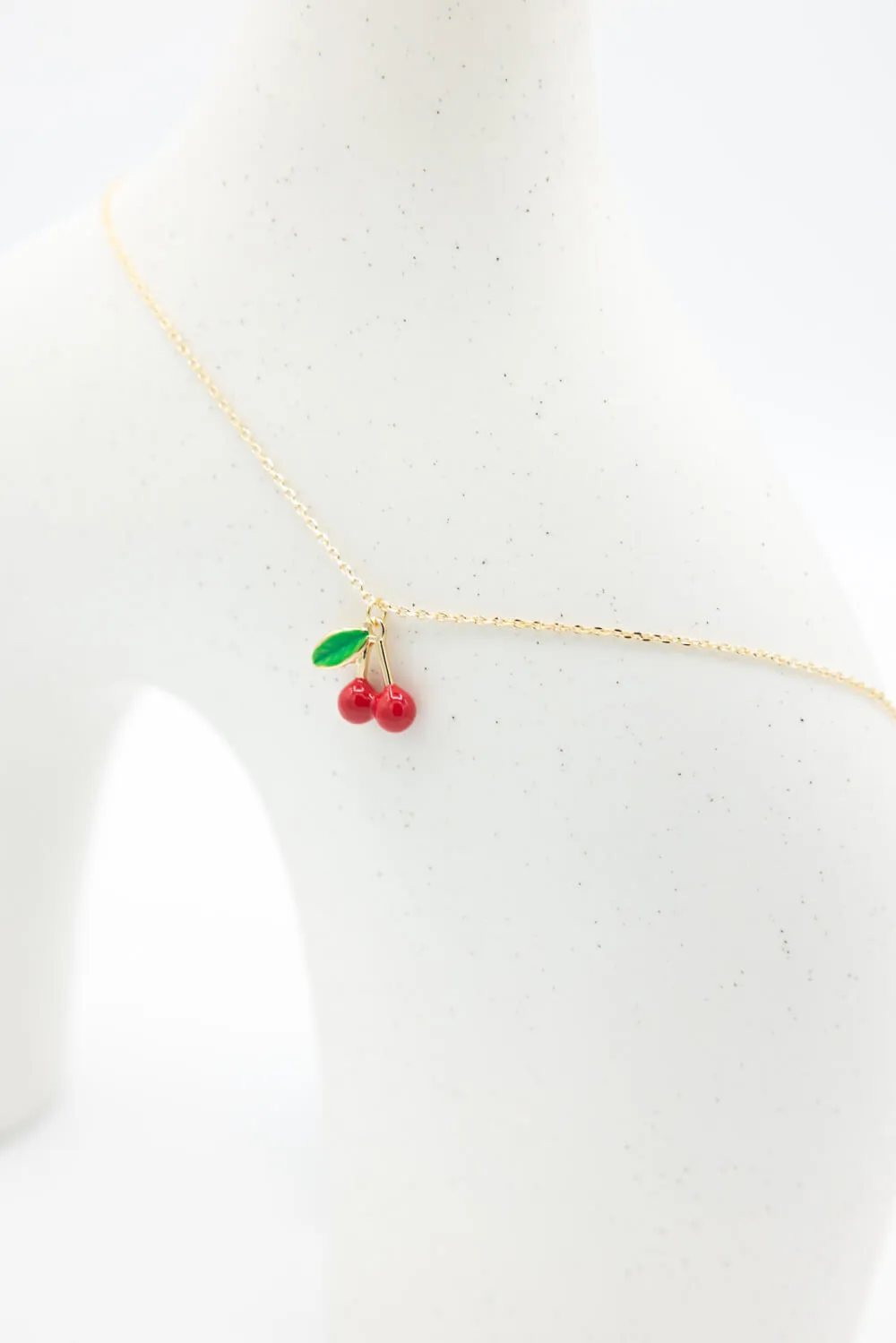 Together Cherry Charm Necklace in Gold | ONB863GDMRD sold by Glik’s