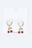 Cherry Huggie Earrings in Gold | QEA934-GDMLT sold by Glik’s