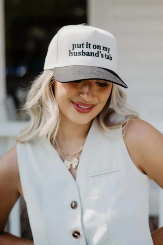 Put It On My Husband’s Tab Trucker Hat for Women in Black/Tan | KDC-BC-1110-BLK-TAN sold by Glik’s
