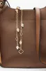 Clover Chain Purse Charm in Gold | JCA045-GDCRM sold by Glik’s