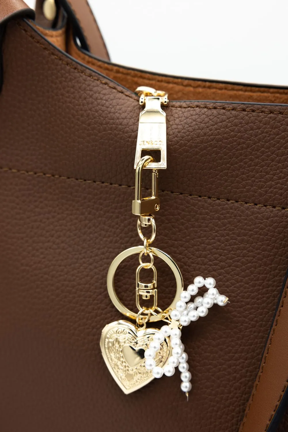 Small Pearl Bow Heart Purse Charm in Gold | NCA067-GDCRM sold by Glik’s product image thumbnail 2