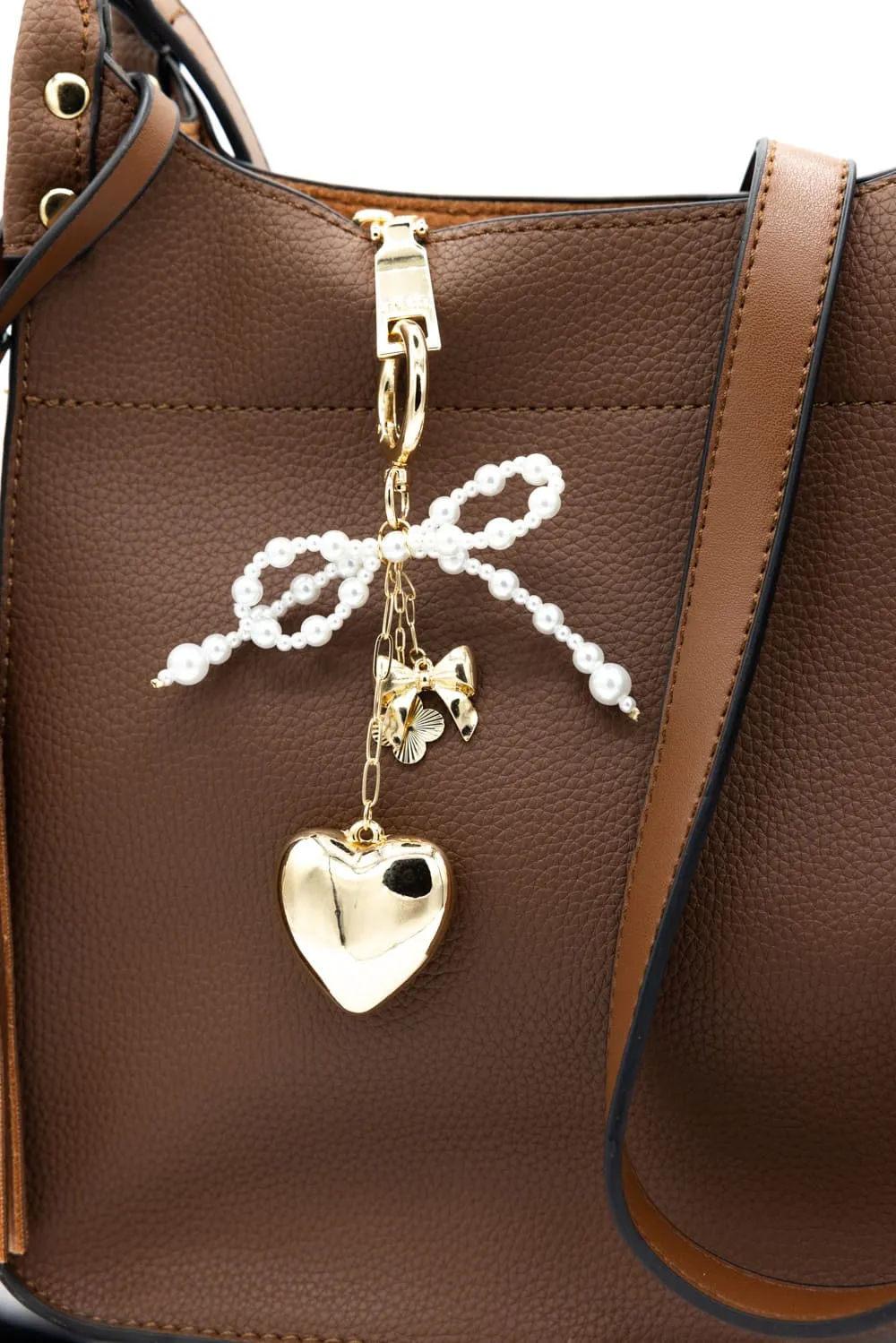Pearl Bow Heart Purse Charm in Gold | NCA056-GDDRM sold by Glik’s