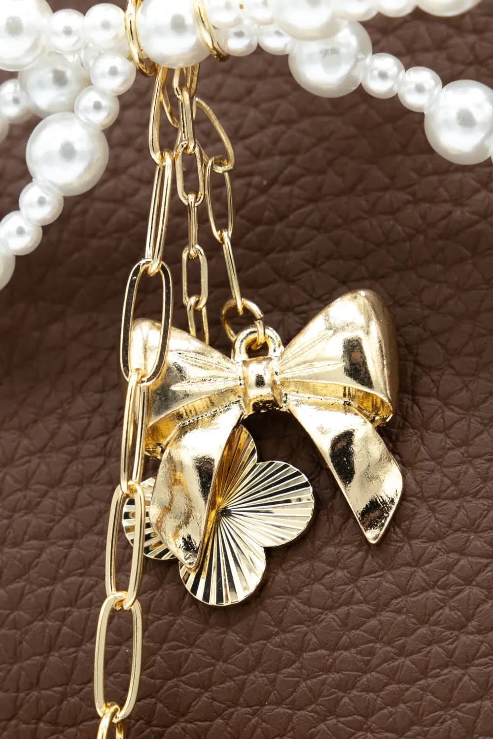 Pearl Bow Heart Purse Charm in Gold | NCA056-GDDRM sold by Glik’s product image thumbnail 2
