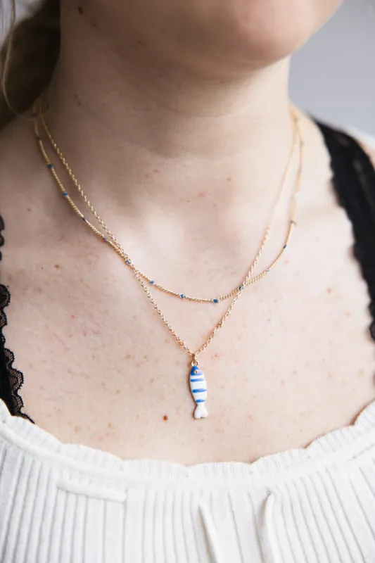 Fish Double Chain Necklace in Gold | PNB354GDBLE sold by Glik’s