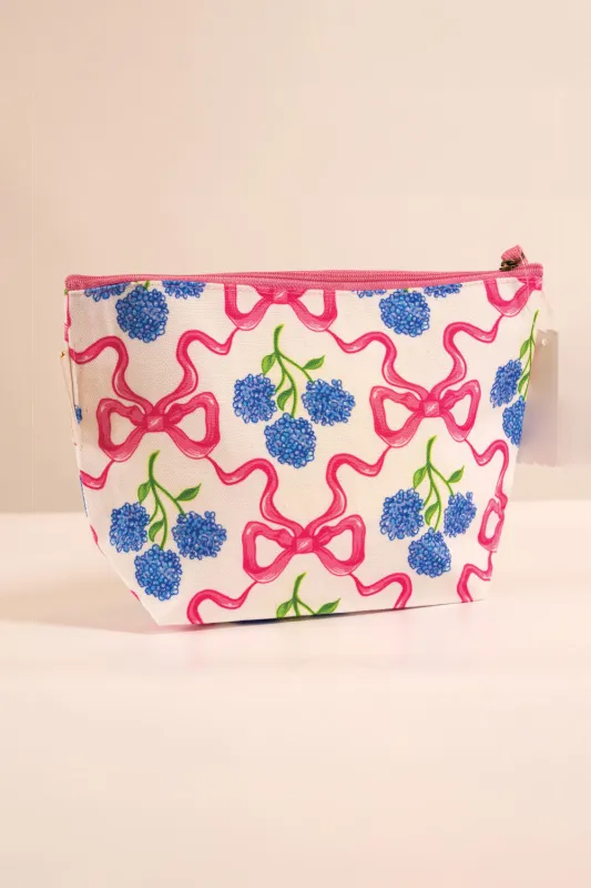 Simply Southern Travel Seaside Pouch Bag in Pink Ribbon | 0125-BAG-POUCH-SEASIDE-RBBN sold by Glik’s