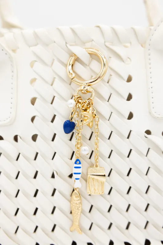 Sardine Blue Heart Purse Charm in Gold | PCA176GDCRM sold by Glik’s