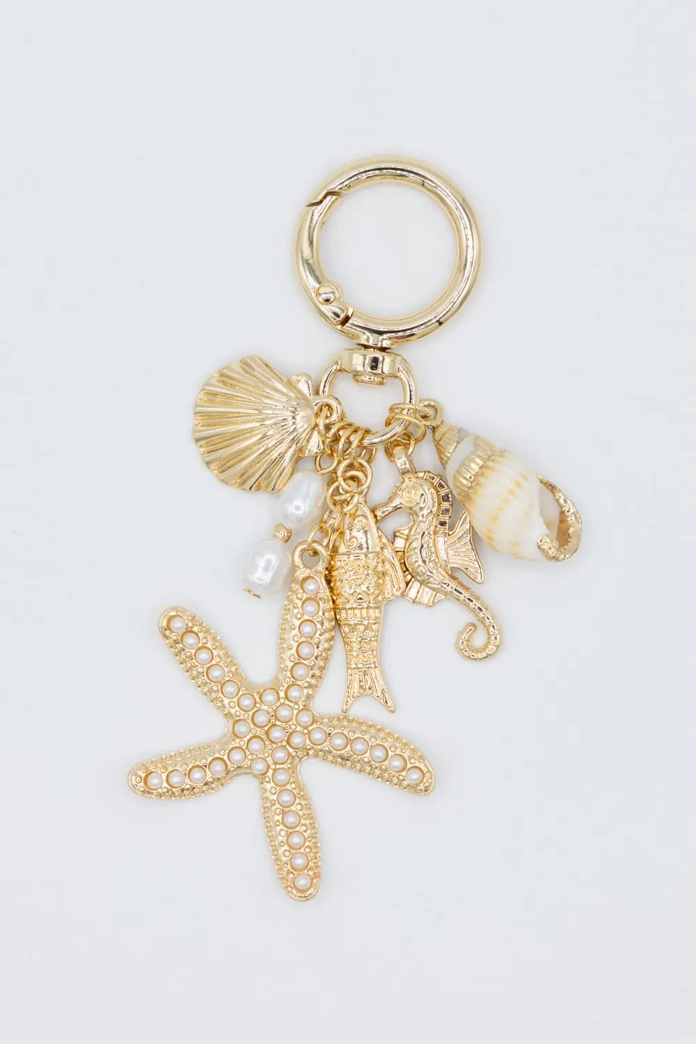 Starfish Shell Pearl Purse Charm in Gold | ECA048GDCRY sold by Glik’s
