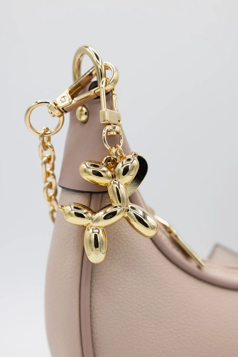 Balloon Dog Purse Charm in Gold | NCA045GD sold by Glik’s