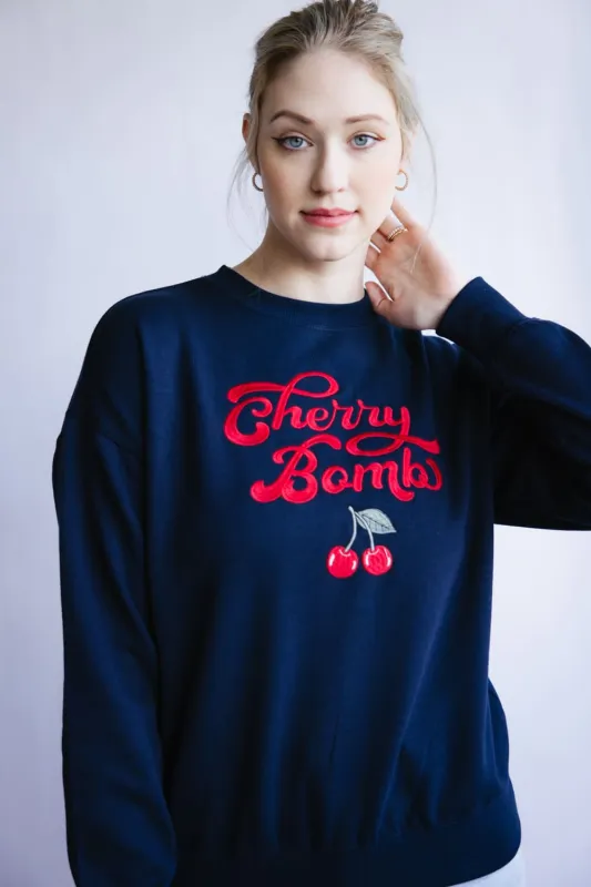 1897 Active Embroidered Cherry Bomb Sweatshirt for Women in Navy | T1316-DEEPNAVY sold by Glik’s
