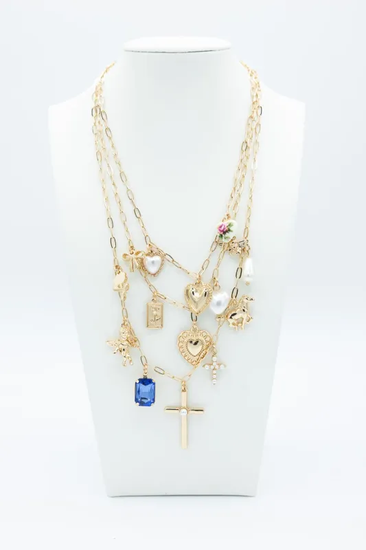 Cross 3 Layer Charm Necklace in Gold | QNC007GDCRM sold by Glik’s