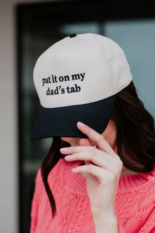Put It On My Dad’s Tab Trucker Hat for Women in Black/Tan | KDC-BC-1154-BLK-TAN sold by Glik’s
