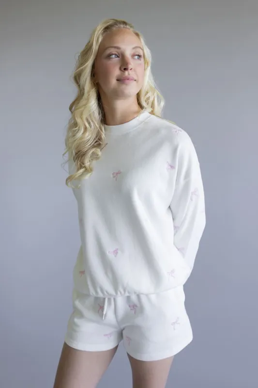 1897 Active Embroidered Bow Fleece Sweatshirt for Women in Ivory | T1019-IVORY sold by Glik’s