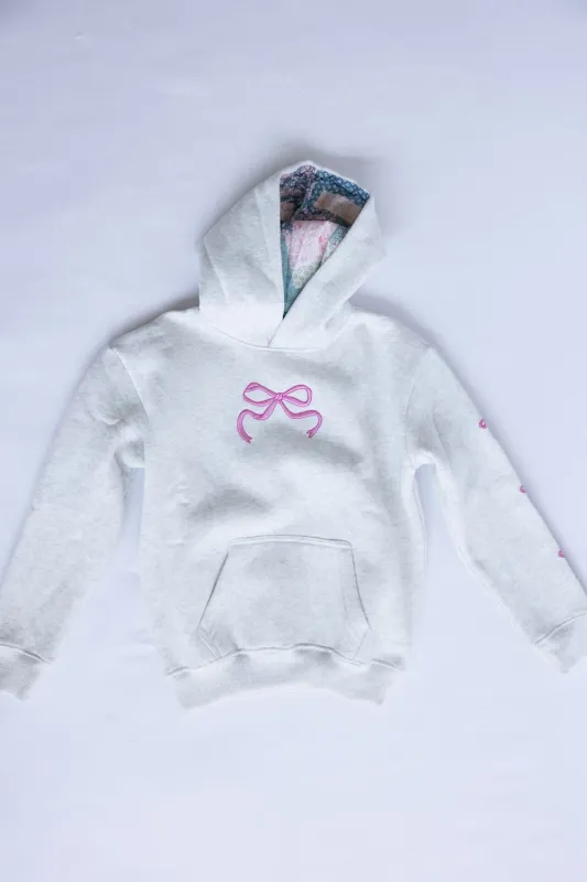 Simply Southern Youth Embroidered Dilara Bow Hoodie for Girls in Heather Grey | PP-0225-YTH-HD-DILARA-BOW sold by Glik’s
