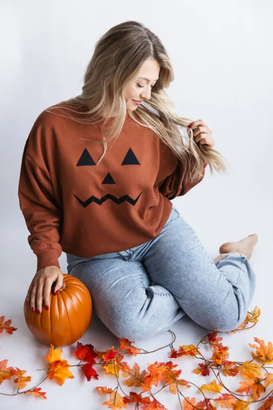 1897 Active Embroidered Pumpkin Face Sweatshirt for Women in Rust | GT892-RUST sold by Glik’s