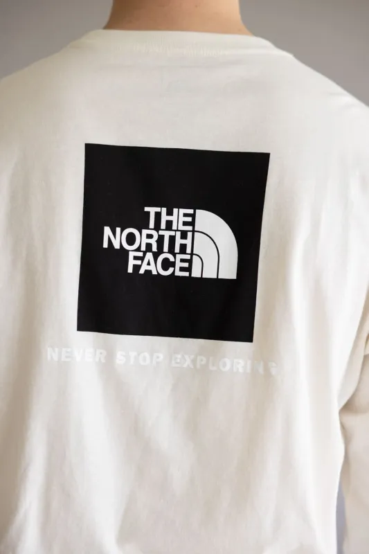 The North Face Box Graphic Long Sleeve T-Shirt for Men in White Dune | NF0A8B68-QLI sold by Glik’s